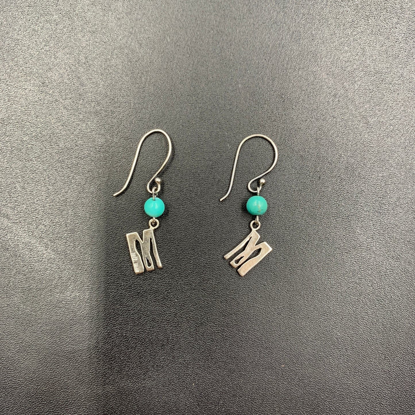 MOQUIP EARRINGS sign SILVER-T