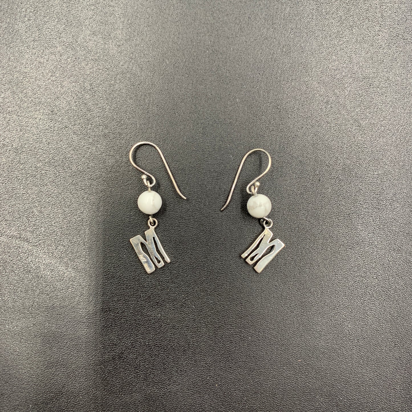 MOQUIP EARRINGS sign SILVER-M